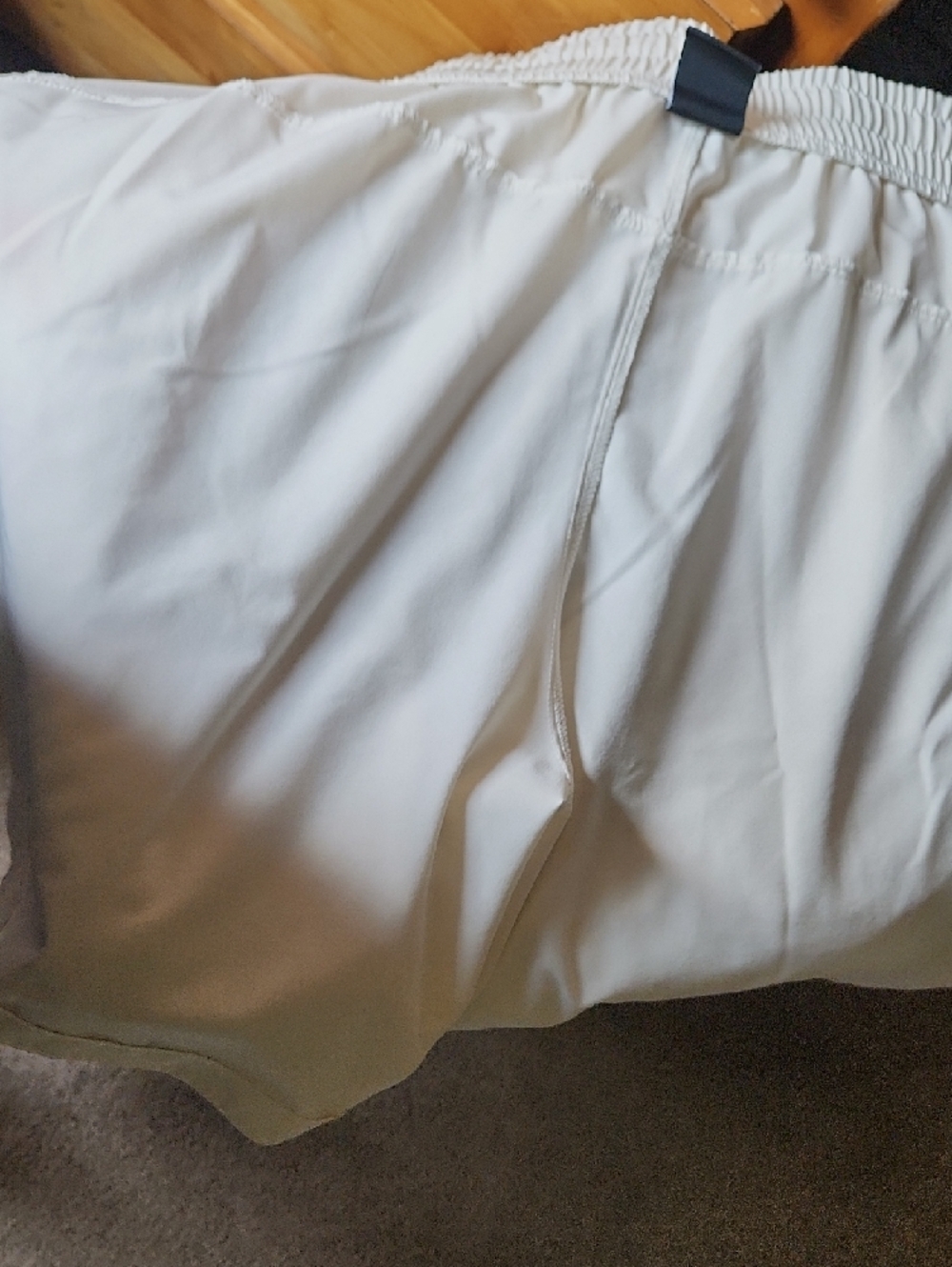 Under Armour Cream Athletic Shorts with Black Logos - Picture 10 of 10